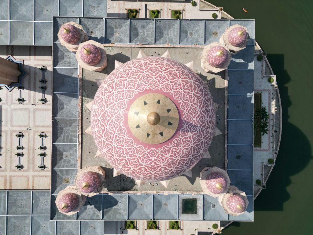 Stunning aerial shot of the iconic pink dome mosque in Putrajaya, Malaysia.